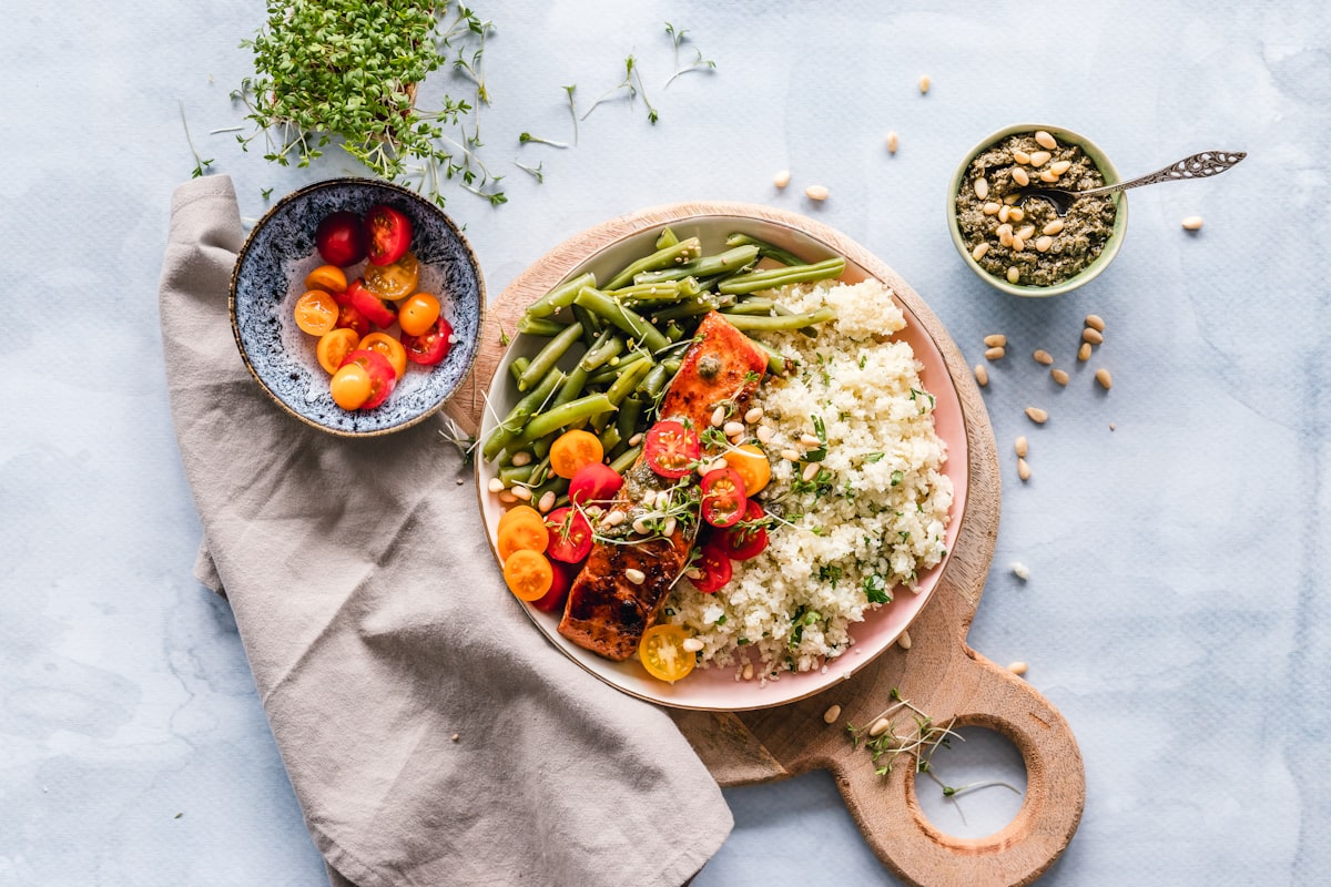 Wooden cutting board with fresh ingredients